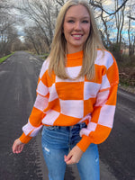 Load image into Gallery viewer, Orange Checkered Exposed Seam Sweater
